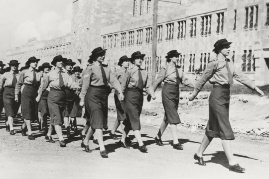Members of A.W.A.S. march in formation in front of the Duhig Building, University of Queensland, St Lucia Campus, Brisbane 