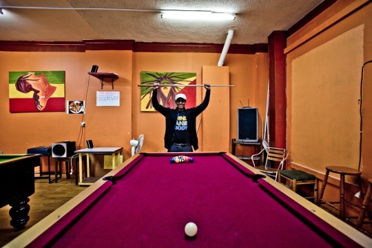 Ozian Legesse playing pool, Moorooka, Queensland, 2013