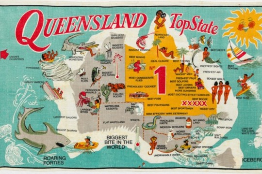 Map of Queensland on a tea towel heralding Queensland as the top state in Australia 