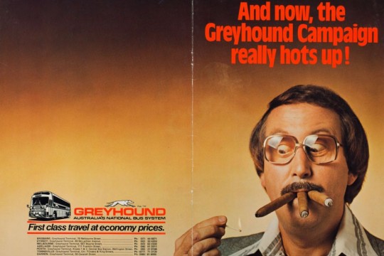 An advertisement for Greyhound busses from the 70s featuring a man holding three ccigars in his mouth and lighting them with a match. The text reads 'And now, th Greyhound Campaign really hots up!'