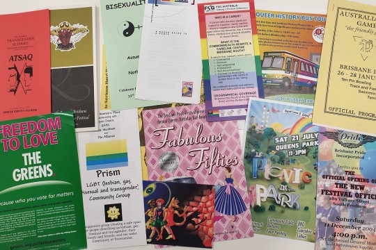 Photo of various ephemera items including brochures, pamphlets and programs.