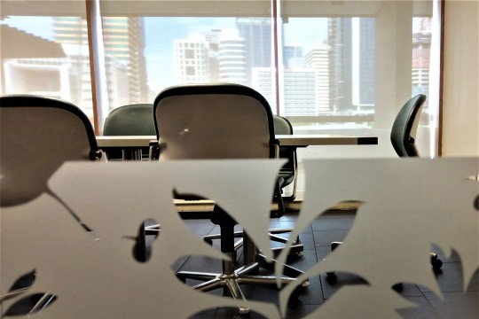 A meeting room seen through the glass wall