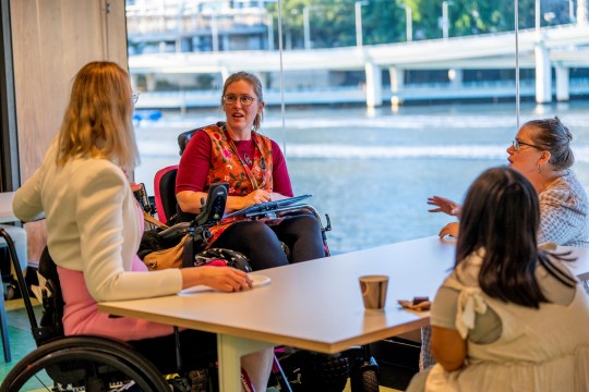 people with visible disability discuss the forum at The Edge