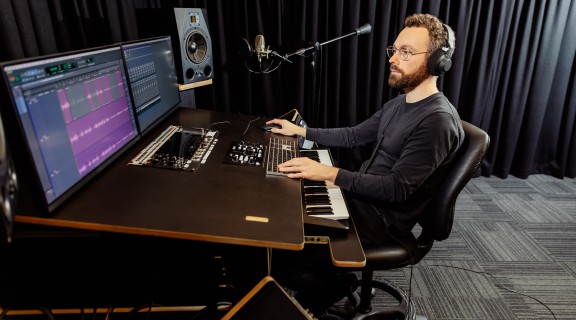 Person using the SLQ Recording Studio