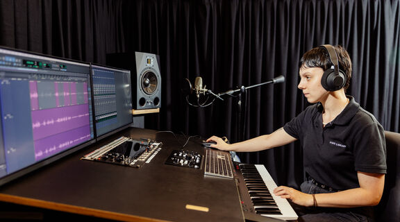 Photo of women in recording studio. Joe Ruckli