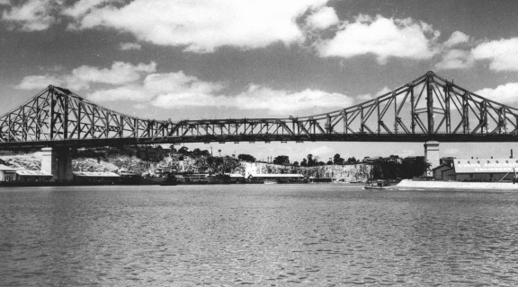 Brisbane's Story Bridge 1940 The 281 metre cantilever bridge was built between1935–1940, constructed by Evans Deakin - Hornibrook Pty. Ltd. The premises of Evans Anderson Phelan Pty. Ltd. Engineers at Kangaroo Point, are visible on the right. The New Farm cliffs can be seen in the background. The bridge connected Fortitude Valley and the southside suburbs. It is heritage listed and now carries 30 million cars per year. 16 bridges cross the river but the Story Bridge remains ‘the grandfather’ of them all.