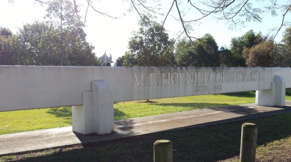 The archway of old Hornibrook Entrance Gates at Bulimba Works, now placed at the entrance to a park on the previous site.