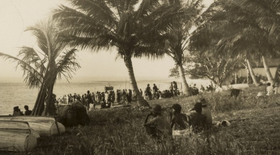 Crowds gathered on the beach at Palm Island, Queensland