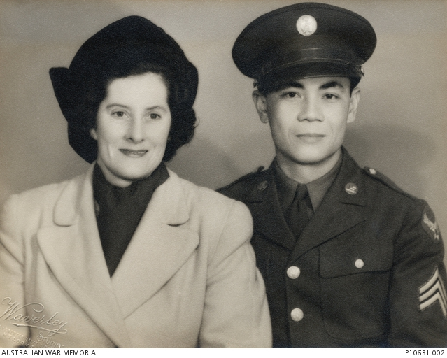 Studio portrait of Sergeant Francisco J Salveron, United States Army, and his Australian de facto wife Clarissa Gray (née Willmett).