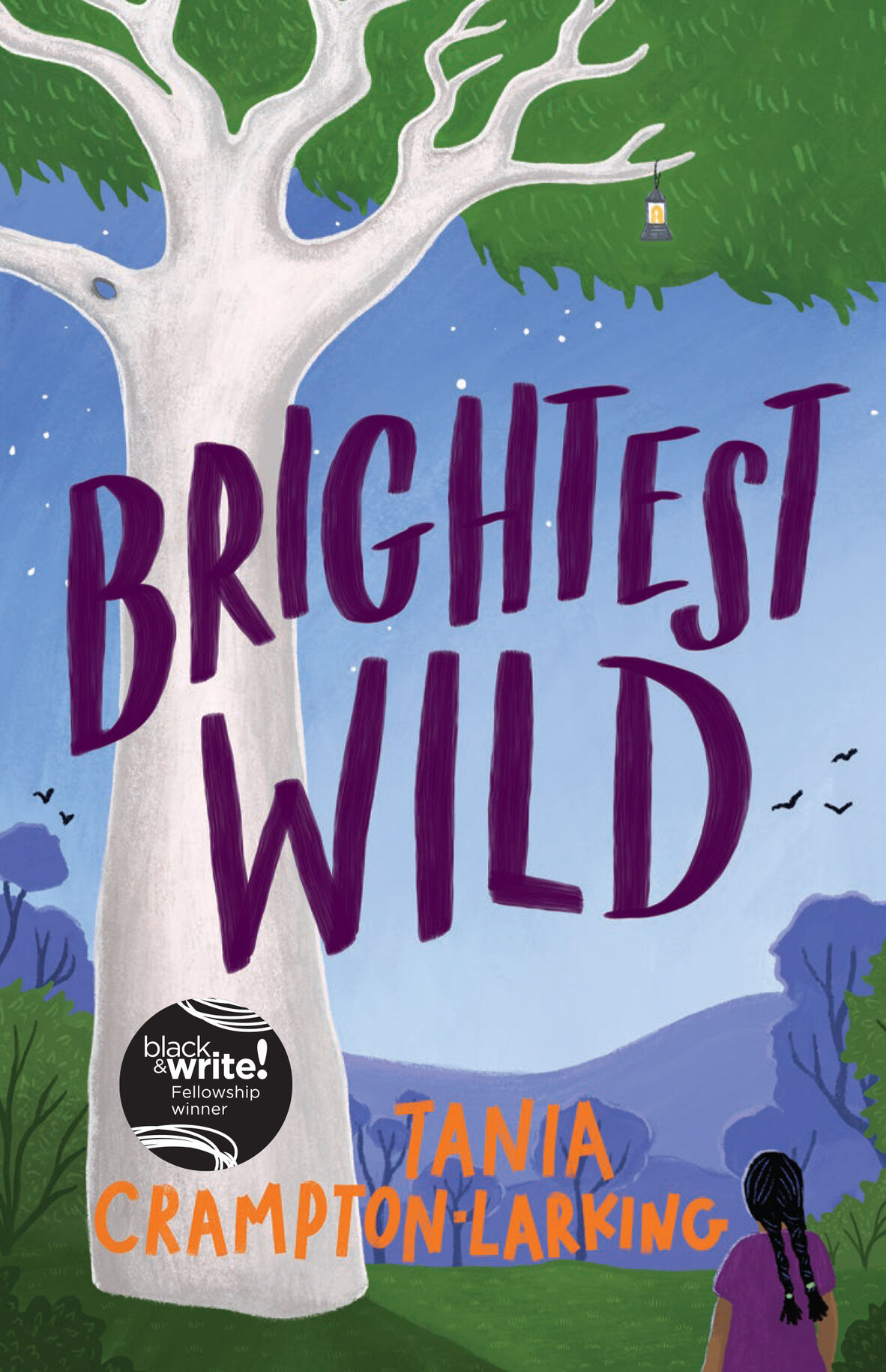 An  eye catching illustrated book cover with a picture of a huge gum tree in the foreground, with a blue twilit sky in the background. The text reads Brightest Wild by Tania Crampton Larking