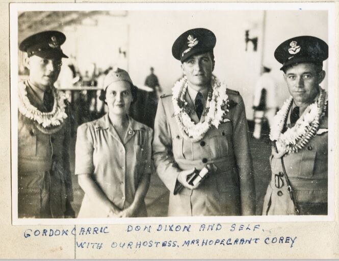 Gordon Carric, Don Dixon and Charles Williams with their hostess Mrs Hope Grant Corey in Honolulu, Hawaii.