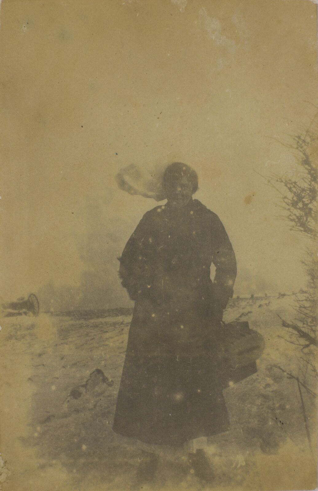 Nurse Constance Keys wearing an overcoat and carrying a bag, Circa 1917.