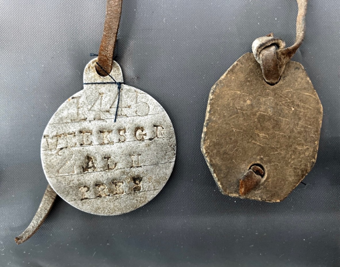 Photograph of George Weeks’ identification discs, returned to his mother Annie Weeks after his death.