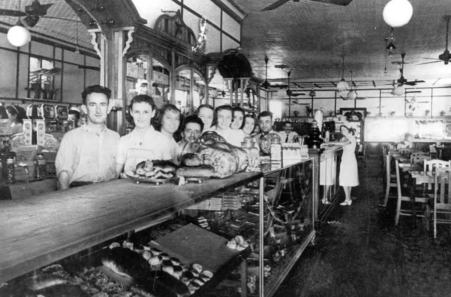 Staff at the counter of the Blue Bird Café