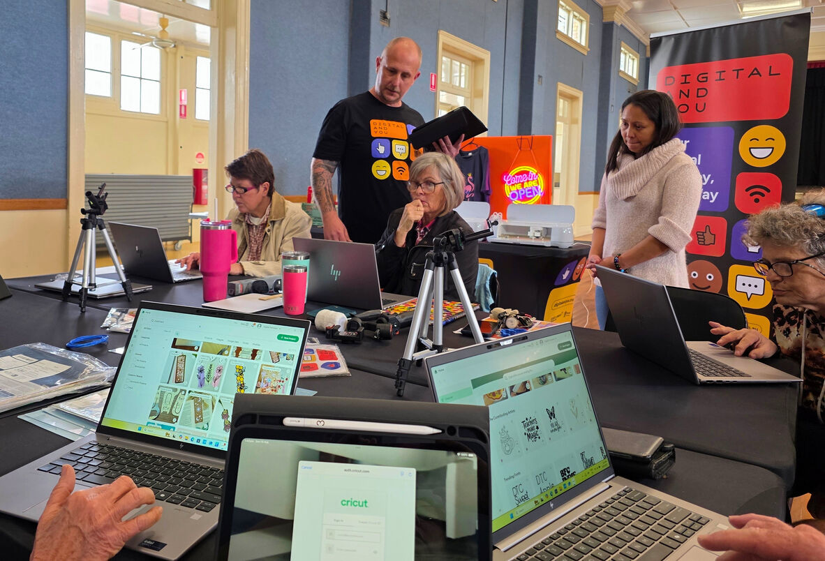 People working at computers in a Digital and You workshop
