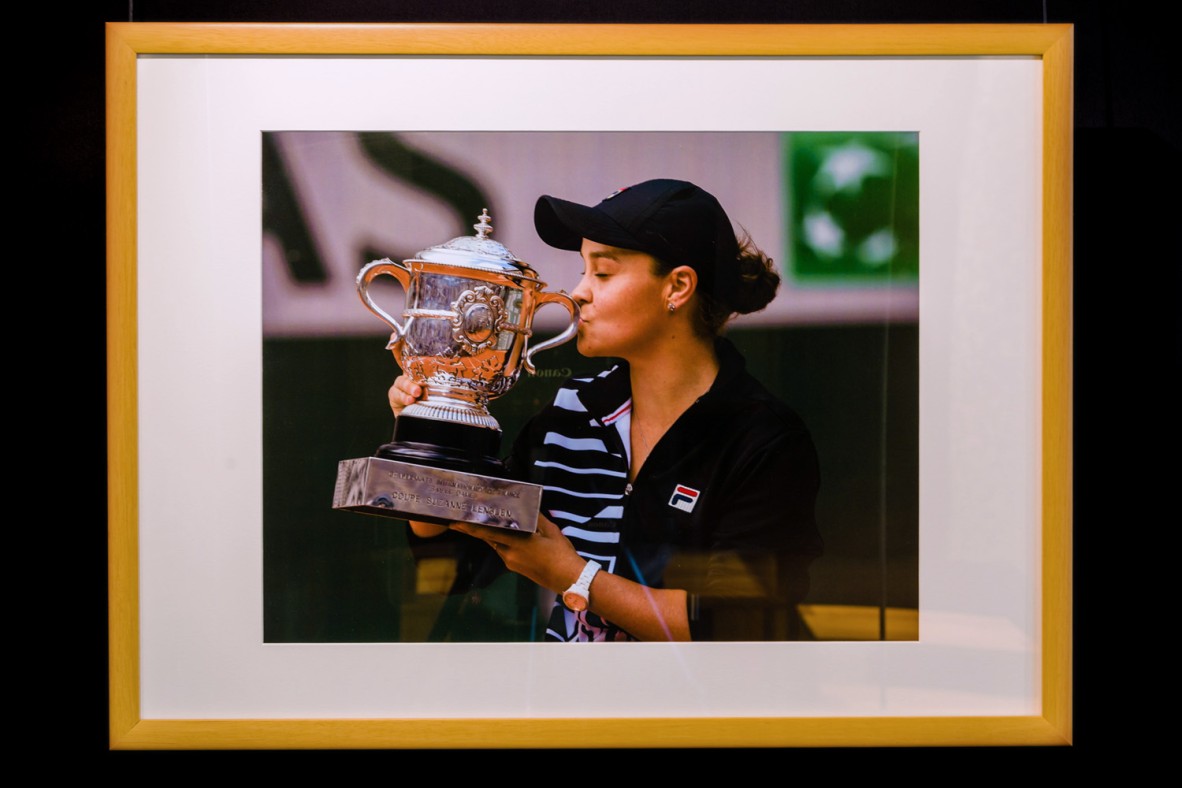 Framed photograph of Ash Barty kissing the winner’s cup.