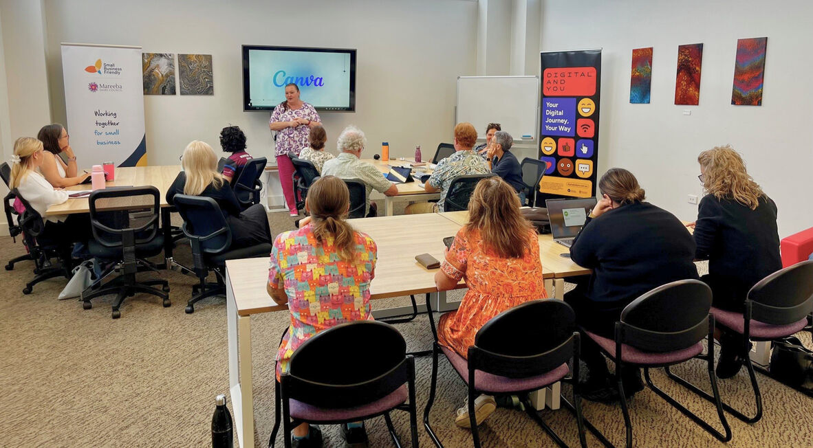 People attending a Canva workshop