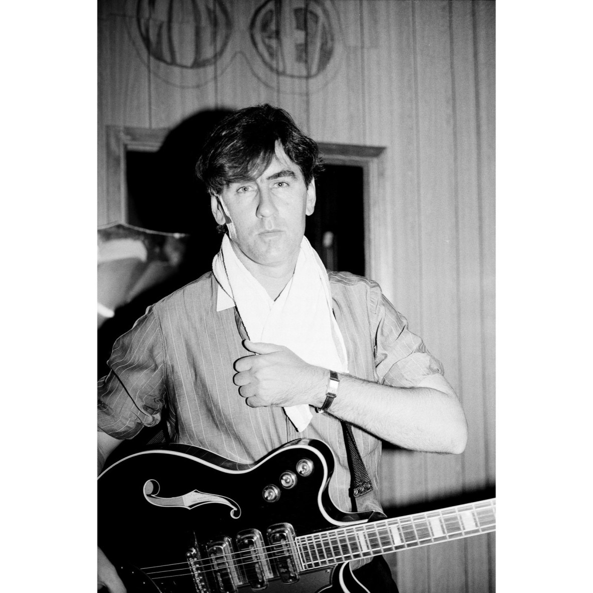 Robert Forster holding his guitar, Zoo Nightclub in Brisbane, 1995