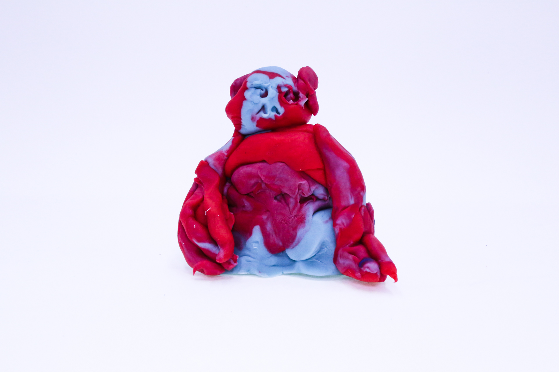 Frankenstein is a red and blue play-dough sculpture of a monster.