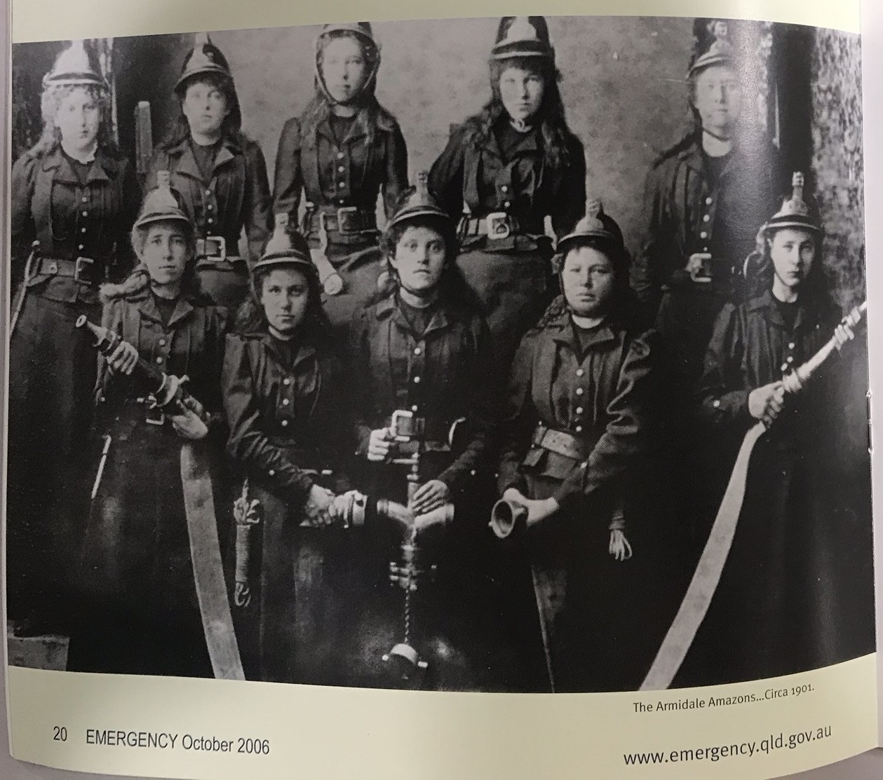Group of women in fire brigade uniforms from early 20th century