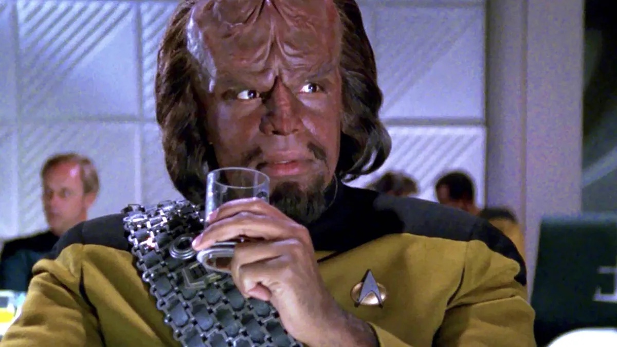 Worf, a Klingon character from Star Trek: The Next Generation, drinking prune juice (a warrior's drink)